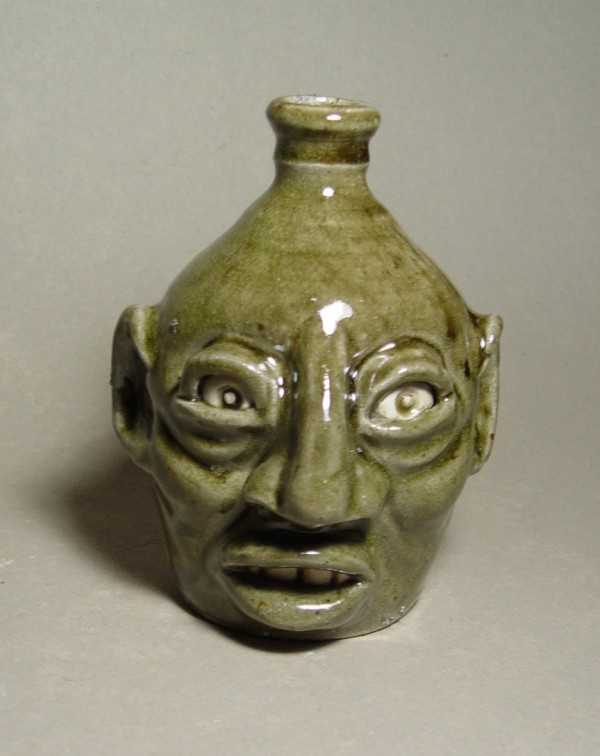 Face Jug: Local stoneware face jug with kaolin details, ash-glazed, wood
