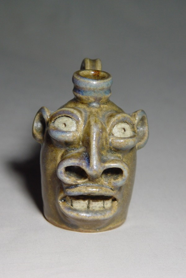 Face Jug: Local stoneware face jug with kaolin details, ash-glazed, wood-fired