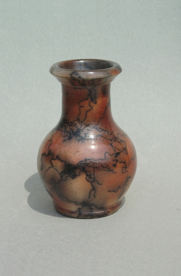 Horse Hair Raku Vase: Porcelain with terra sigillata, colored with ferric chloride